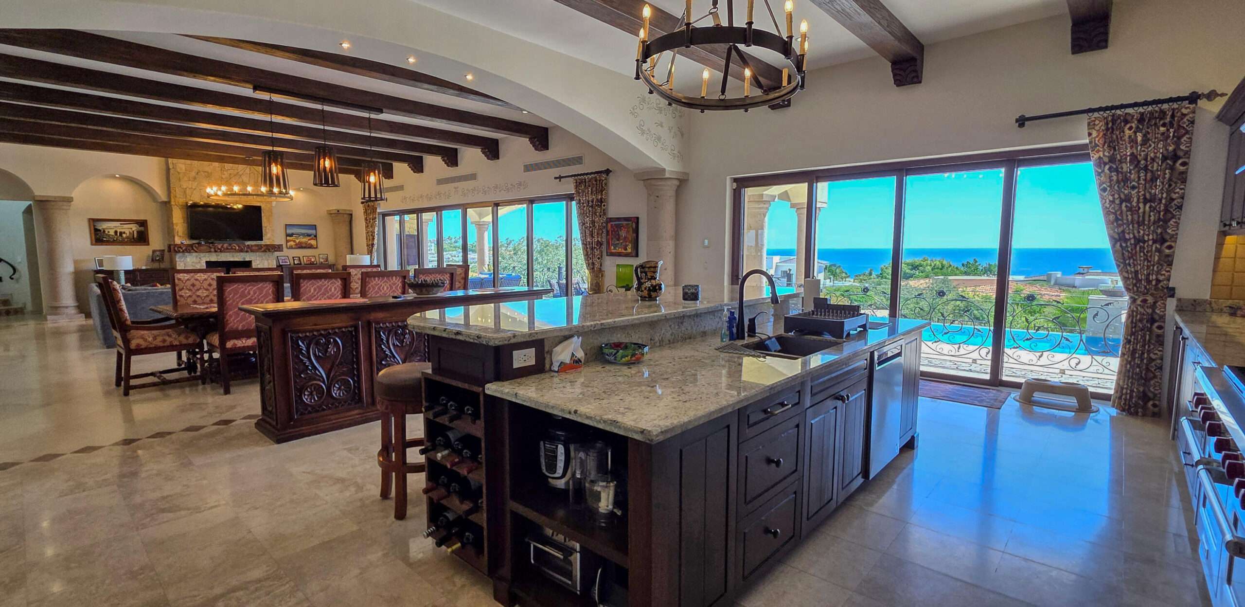 Cabo Luxury Vista Lagos This beautiful fully furnished property, named ''Casa de Hermanos,'' is built on two levels and features 5 bedrooms and 6 bathrooms, an entertainment room, and a two-level entry. The living room and dining room (with seating for 10) open to a very large kitchen and a service area. On the terrace there is a pool with a Jacuzzi, a fire pit area with sun loungers, and a Kitche with a BBQ Area, including Sink & Fridge. Most extraordinary are the for sale