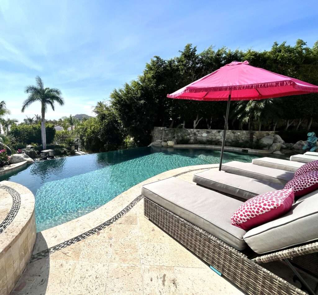 Cabo Luxury Las Tunas The Nacuii Residence is a refined luxury home crafted to exceed the expectations of even the most discerning buyer. Nestled on a generous and private 3,000 m² lot (0.73 acres), it's just a short, effortless stroll to the untouched, sandy shores of Las Tunas — perfect for enjoying the serene coastal landscape and dramatic sunsets. The home offers a thoughtful layout with 3 spacious bedrooms, a separate studio, a cozy TV lounge, and 6 full bathrooms, including two principal suites, a guest room, a detached studio, and a dedicated media or family room. Expansive sliding glass doors invite natural light throughout the interiors while showcasing tranquil garden for sale