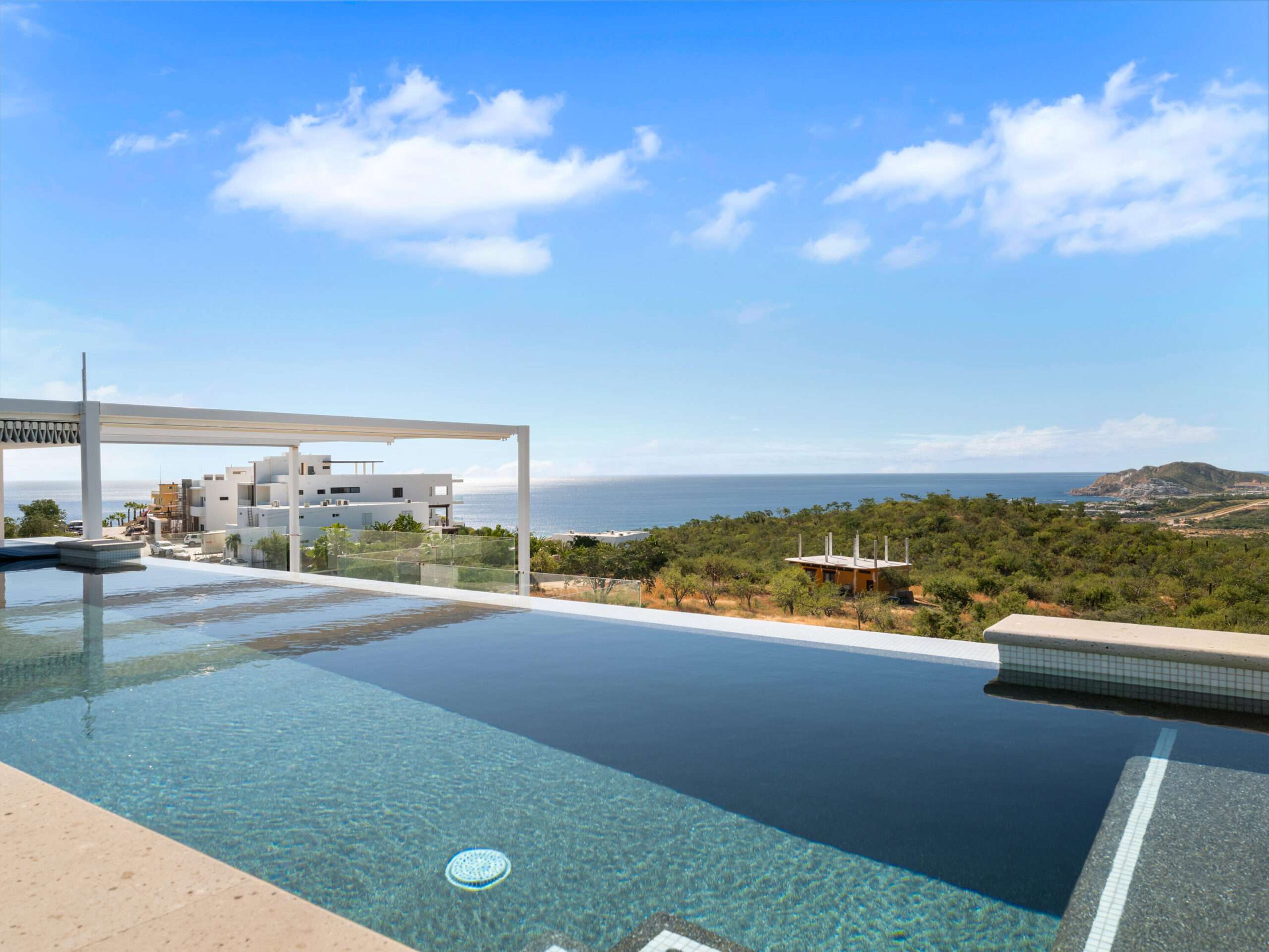 Cabo Luxury El Tule-Inland:General SAVVY INVESTOR'S DREAM -- BUILT WITH EXCEPTIONAL QUALITY & LIMITLESS POTENTIAL. A rare turnkey development opportunity distinguished by elite construction standards - a level of quality seldom found in Los Cabos. Offered as a complete 10-unit boutique project, it includes two fully finished, luxury turnkey residences showcasing the superior craftsmanship, premium materials, and structural durability that define this development. The remaining eight units are structurally prepared and ready to be completed according to the existing design or customized to match the buyer's vision. Blueprints are in early conceptual stage and can be modified to create a variety of high-value concepts, such as: Boutique hotel, Luxury branded residences, Wellness or medical retreat, Corporate retreat or co-living concept, Exclusive rental community.Located in the high-demand Corridor between Cabo San Lucas and San José del Cabo, the project benefits from exceptional visibility, strong rental demand, and for sale