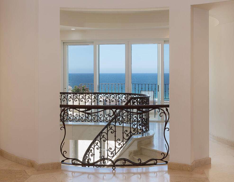 Cabo Luxury Pedregal Csl Villa Marcella sits on an exquisite piece of ocean front property in the exclusive community of Pedregal in Cabo San Lucas. This 6 bedroom 9 bathroom beach estate has a very private location with it's natural mountainside to it's left that make it perfect for entertaining large beach parties, family gatherings, it has even been known to host quite a few a weddings. The beach estate consists of outdoor fire pit, Olympic size swimming pool, jacuzzi, outdoor cooking area, indoor game and bar room accessible from the beach. Enjoy the long beach walks and beautiful Pacific sunrises and sunsets from this beach home. Excellent INVESTMENT property or private home on the beach. for sale