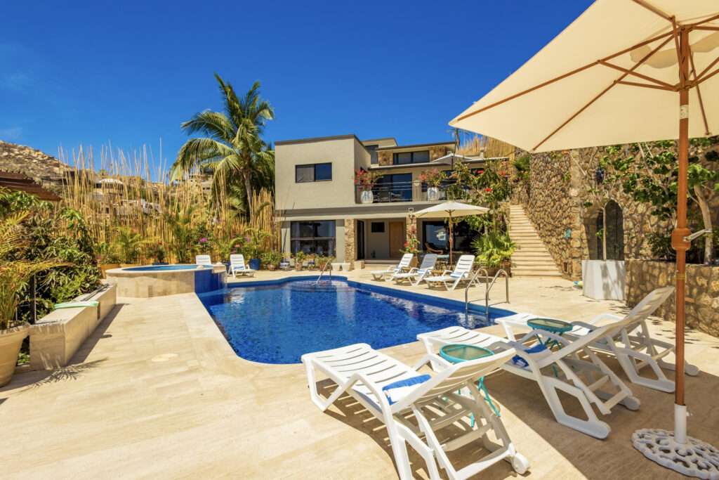 Cabo Luxury Hacienda Csl Villa 5 sits right on El Médano Beach. It's a fully renovated four-bedroom beachfront home that'scomfortable, practical, and easy to live in. The layout is open and spacious, with indoor areas thatflow straight out to a large ocean- – Pedregal Camino Grande 40, Cabo San Lucas, BS