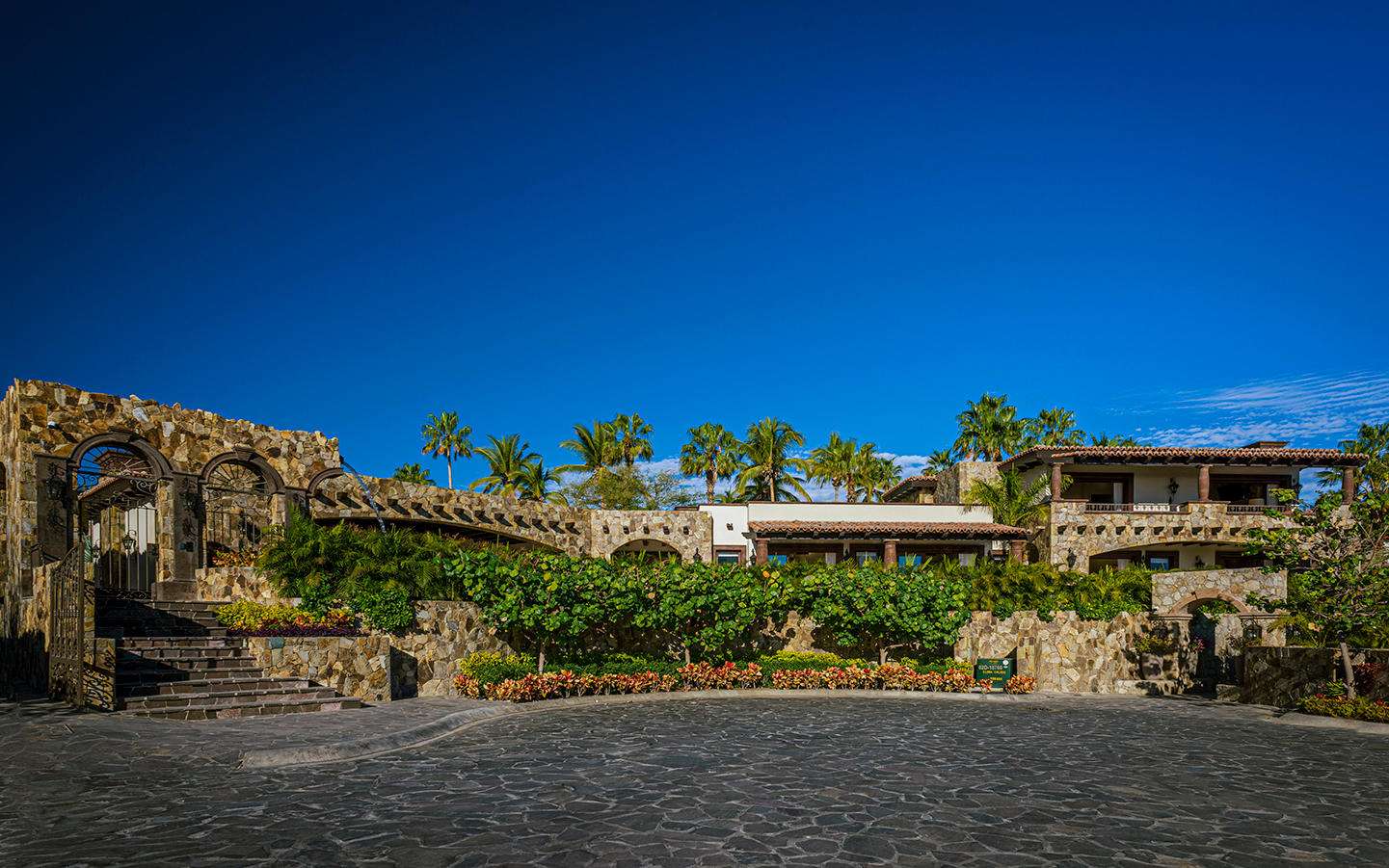 Cabo Luxury Section 4- Las Canadas Discover refined indoor-outdoor living at Cañada 9, set within Querencia, San Jose del Cabo's premier private golf community. Soaring beamed ceilings, walls of pocket glass, and luminous marble floors define an open great room that flows effortlessly to the terrace, infinity-edge pool, and stone-clad water feature -- all framed by panoramic Sea of Cortez and mountain for sale