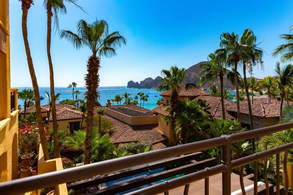 Cabo Luxury Hacienda Csl This fully renovated three-bedroom property offers a seamless indoor-outdoor layout designed for comfortable coastal living.The private terrace features a pool, hot tub, BBQ area, and a dedicated outdoor bar, complemented by a shaded lounge and seating area surrounded by mature landscaping, ideal for entertaining or everyday relaxation. The ground-level setting allows easy access to outdoor spaces while maintaining privacy. Inside, the residence has been completely updated with clean, modern finishes and a functional floor plan. Bedrooms are well sized and thoughtfully distributed for both owners and guests. The layout includes a family suite / additional sleeping space (bunk room or flex sleeping area), allowing accommodation for up to 8 guests, offering greater flexibility than the typical 3-bedroom layout designed for six.Set in one of the most desirable areas of Cabo San Lucas, the property enjoys direct beach access and close proximity to the marina, restaurants, and services, all within the Hacienda Beach Club community. – 1102 Beachfront Hacienda, Cabo San Lucas, BS